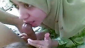 Modest girl hides her beauty behind a veil