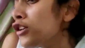 Petite woman engages in sexual activity