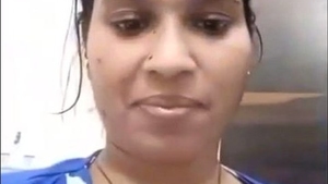 This video highlights the stunning curves of a bhabi's ample rear end
