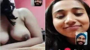 Pretty Indian girl flaunts her breasts in a video call to her lover