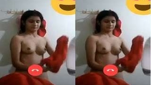 A stunning woman flaunts her breasts and intimate area in a video chat