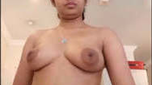 Aroused brunette explores pleasure with Ohmibod vibrator