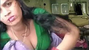 Atashi Roy, a milky-skinned housewife from Marwadi, reveals her cleavage and navel in a seductive display