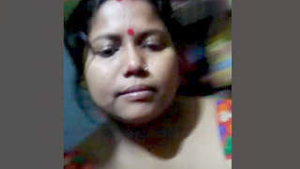 Indian woman flaunts her breasts and pussy on camera