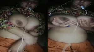 Pakistani woman flaunts her ample bosom in front of the camera