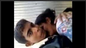 A young woman from Bihar with large breasts is playfully fondled
