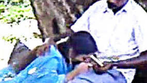 Tamil uncle and Asian girl enjoy park-side suckling in steamy video