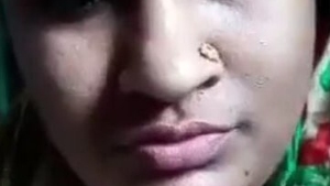 A young woman from a village entices her partner in an erotic recording