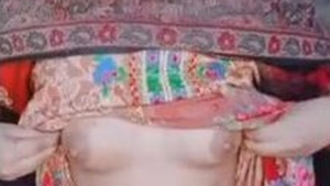 Busty hijabi girl reveals her hairy pussy and boobs