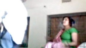 A sultry Indian wife indulges in pleasure with her employer