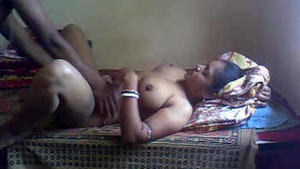 Aroused wife gives oral pleasure to her husband's penis