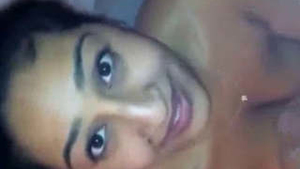 An enticing Indian woman performs a passionate oral sex act in this heated video