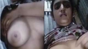 Indian babe with big tits pleasures herself in a steamy solo video