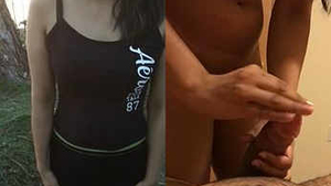 A seductive woman performs oral sex and has intercourse with a male partner outdoors