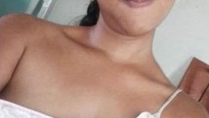 Desi beauty reveals her alluring breasts and indulges in self-pleasure