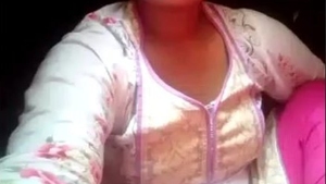 A stunning village woman displays and stimulates herself with her fingers