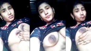 Busty babe flaunts her assets in a seductive manner