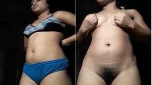 Watch a stunning Indian babe pleasure herself with body oil
