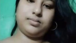 A sultry Desi woman reveals her intimate parts in a heated video