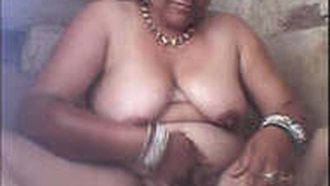 Mature mom enjoys a relaxing bath in rustic setting