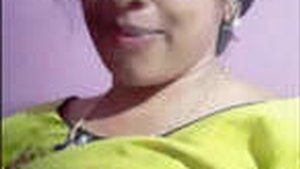 Indian auntie with big breasts gets naughty