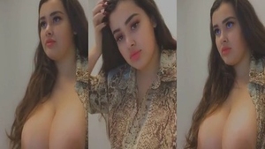 Big-boobed Indian babe flaunts her assets in a selfie video