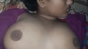 Husband takes advantage of sleeping wife's large breasts in video