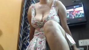 Indian wife with huge boobs gives a cam show