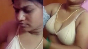 Desi aunty flaunts her hot breasts in seductive video