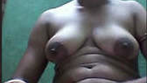 Indian aunt displays breasts and vagina