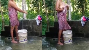 A girl takes a bath in the great outdoors