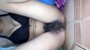 Arousing Tamil girl pleasures herself with fingers and tongue