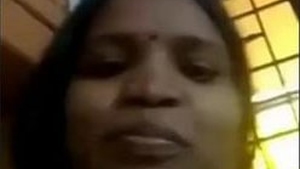 Indian woman Tia flaunts her large breasts and intimate area in Telugu video