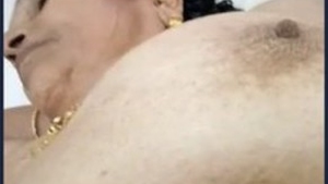 Mature aunty goes nude in front of camera