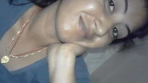 A South Asian woman reveals her intimate parts to her partner