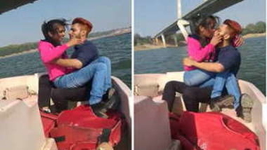 Indian Desi couple shares passionate kisses on boat, ready for sexual encounter