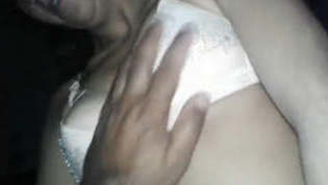 Seductive wife fondles her breasts and rides a penis