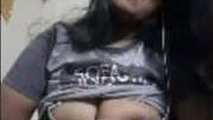 Indian girl flaunts her large breasts in a video