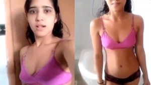 Cute girl in a bathtub gets naughty