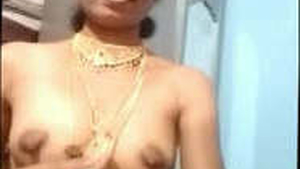 Aunty Telugu flaunts her boobs and pussy in traditional jewellery