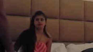 A young couple checks into a hotel room for some steamy action