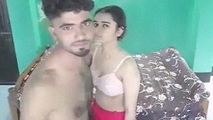 A cute girl and guy in a sensual video