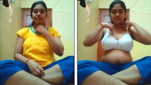 A college girl shares her large breasts in a self-shot video for her boyfriend