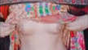 A hijabi beauty reveals her large breasts and unshaven genitalia