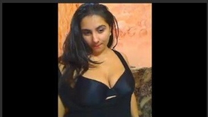 A voluptuous woman indulges in self-pleasure on webcam