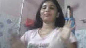 A seductive Indian beauty takes a bath
