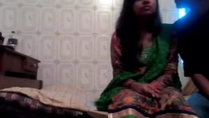 Hidden young Indian couple in a steamy video