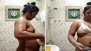 Titillating Indian housewife reveals her small XXX boobs for a bit