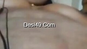 Horny MILF actively rubs and fingers her wet Desi twat for XXX vid