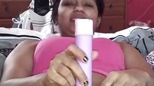 Pakistani beauty using a long dildo sex toy to masturbate